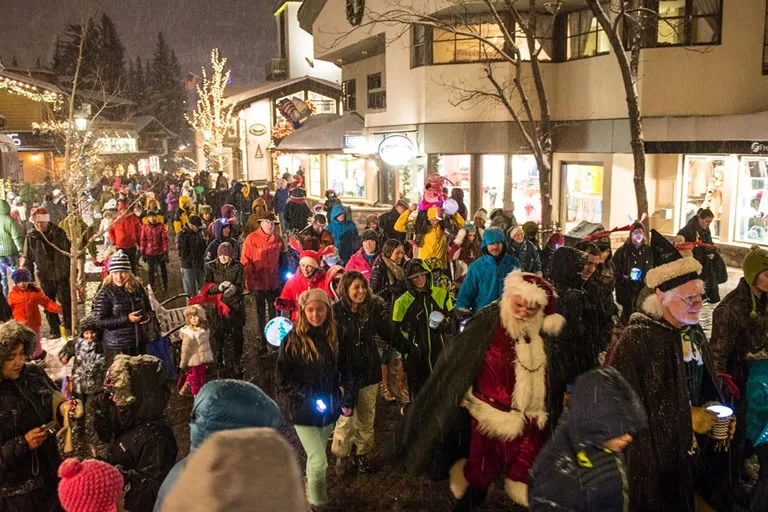 Santa leads lantern walk Vail Colorado | Vail transportation